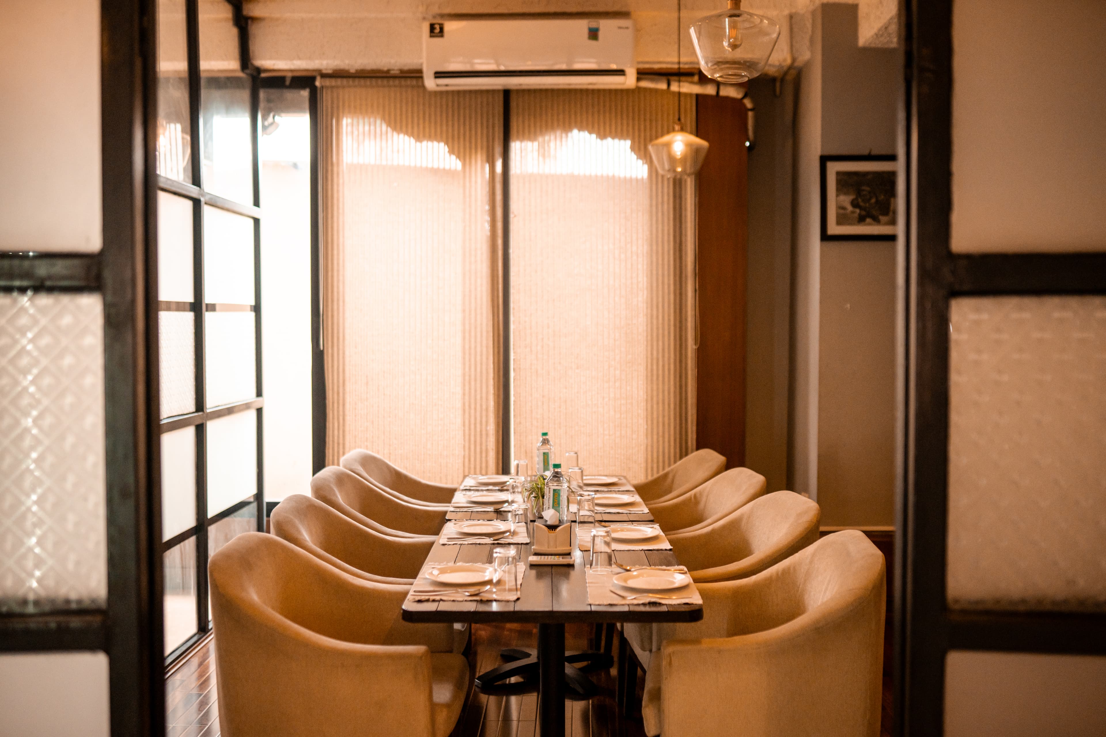 Calm office dinners, team meals and hosted conversations with premium bar support. at The Bengal